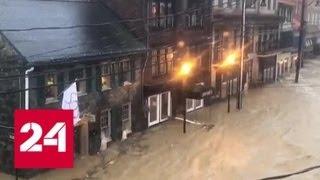 Потоки воды затопили город в США - Россия 24