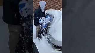 Using a child to clean snow off your car