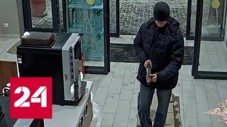 Разбойное нападение Робокопа на заправку попало на видео - Россия 24