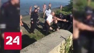 Пьяный нарушитель после ДТП попытался уплыть от полицейских по Оби - Россия 24