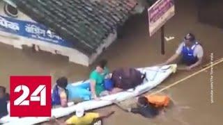 На западе Индии мощное наводнение: власти обратились за помощью в эвакуации к военным - Россия 24